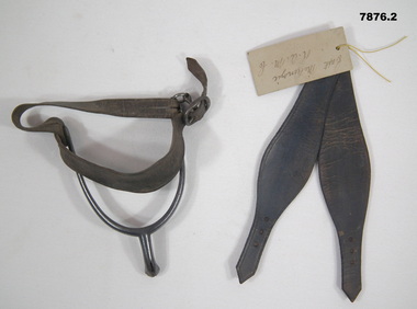British Spur and leather straps.