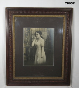 Framed black and white portrait photograph.