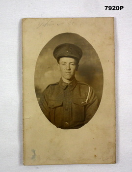 Sepia toned photograph of a WW1 soldier in uniform.