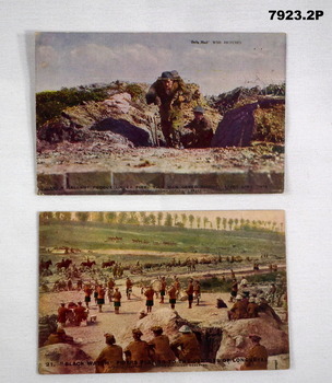 Two coloured postcards featuring WW1 Battlefield scenes.