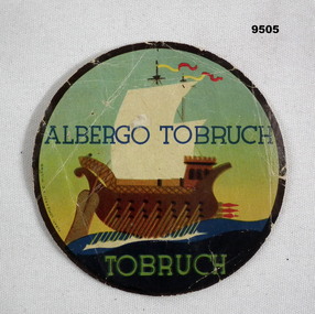 Small souvenir coaster from Hotel Tobruch.