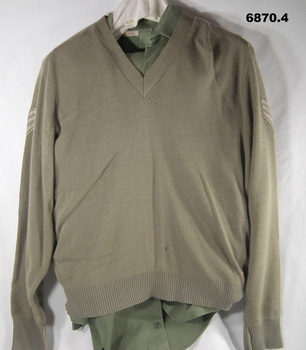 Greens, shirt and trousers, khaki jumper.