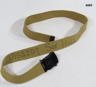 Belt, Khaki with adjustable black buckle.