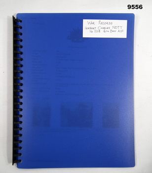 Blue coloured display folder containing copies of WW1 service record.