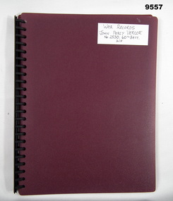 Maroon coloured display folder containing WW1 Service record.