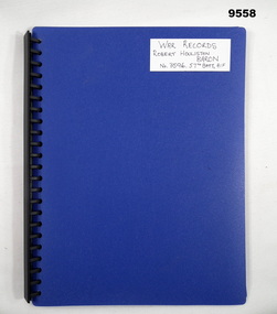 Blue coloured display folder containing WW1 service record.