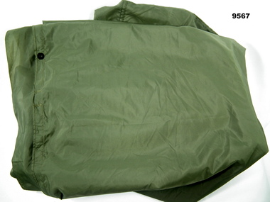 Green Nylon blanket cover.