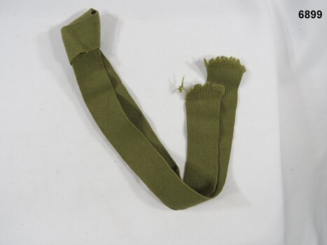 Woollen khaki Army tie worn with uniform.