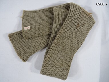 One pair of khaki woollen shin socks.