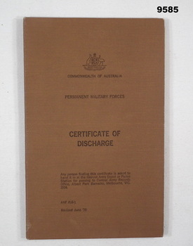 Certificate of Discharge in brown buckram folder.