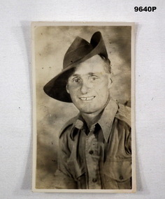 Black & white portrait of a soldier in slouch hat. WW2.