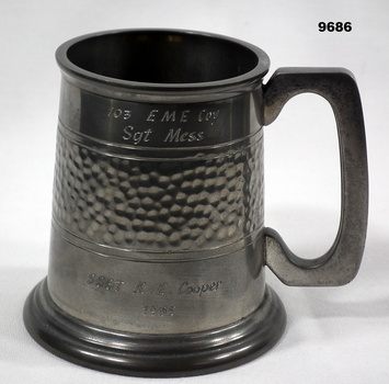 Pewter tankard with recipient's name engraved on side.