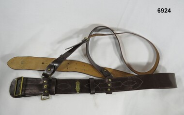 Brown leather Sam Browne belt.