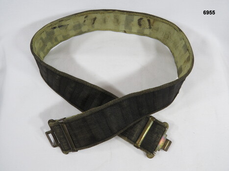 Webbing belt - blackened with brass fittings.