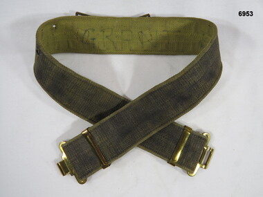 Belt, webbing, blackened with polished buckle.