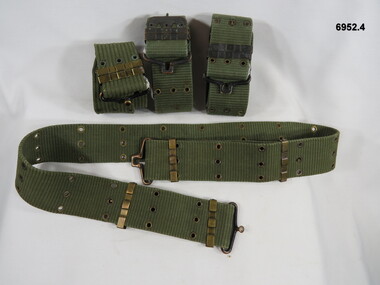 Modern green webbing waist belts.