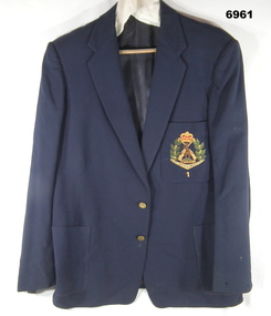 Blue jacket with RAR logo.