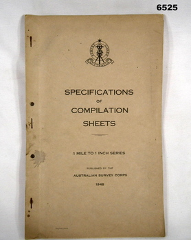 A foolscap sized buff coloured card covered document, stapled and two holed punched