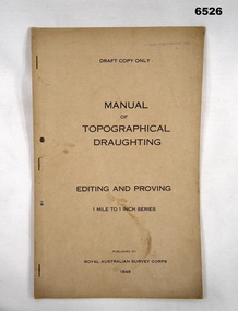 A foolscap sized buff coloured covered document, stapled and two hole punched
