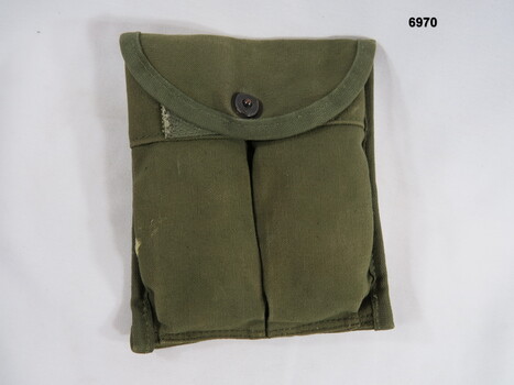 Small double compartment ammunition pouch.