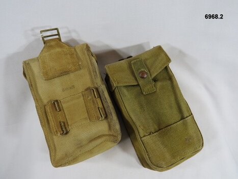 Two rectangular Utility Ammunition Pouches with Web Belt attachments.