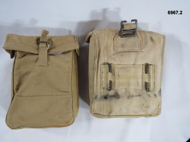Two utility ammunition pouches of a larger size.