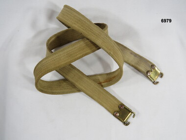 Rifle webbing sling for over the shoulder carrying.