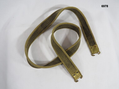 Rifle webbing sling for over the shoulder.