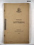 A foolscap sized light buff coloured card covered booklet with fastener