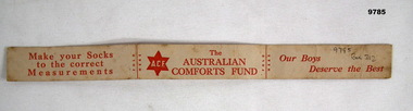 Australian Comforts cardboard sock measure.