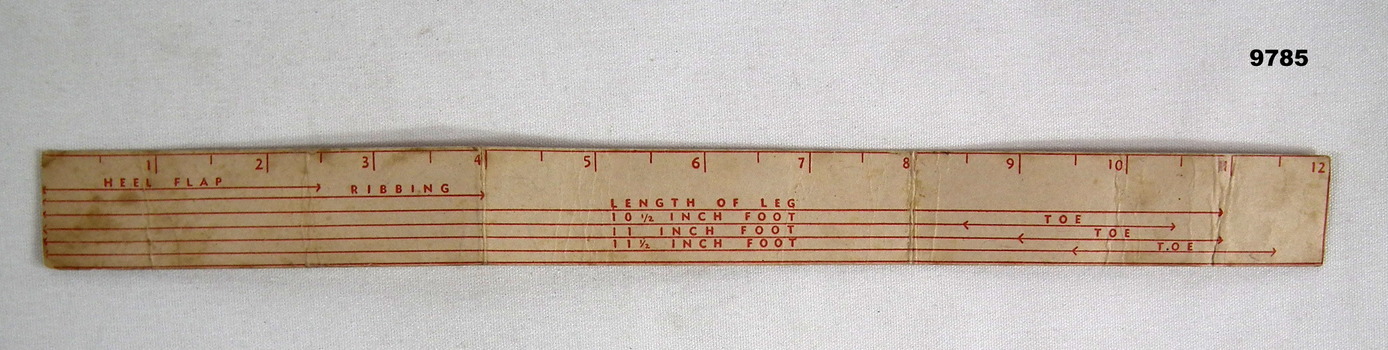 Australian Comforts cardboard sock measure.