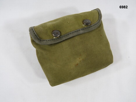 Khaki canvas medium utility pouch.