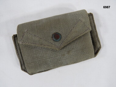 Small khaki rectangular utility pouch.