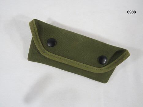Small army green utility pouch.