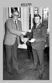 Presentation of Fundraising Cheque from the Army Survey Regiment Officers Mess to the Chairman of Bendigo’s Olympic Fundraising Committee. 1983.