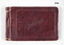 Hard cover autograph book with handwritten messages on coloured paper pages.