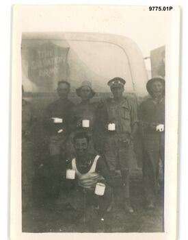 9775.01P. Western Desert Alamein.  Coffee with the Salvos truck Alamein front.