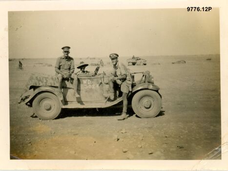 9776.12P Western Desert Tobruk two officers and driver in captured Italian car