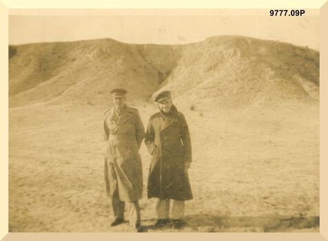 9777.09P Western Desert Two officers in front of Hill no information