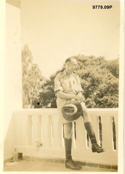 9779.09P Egypt Cairo Soldier seated no hat 