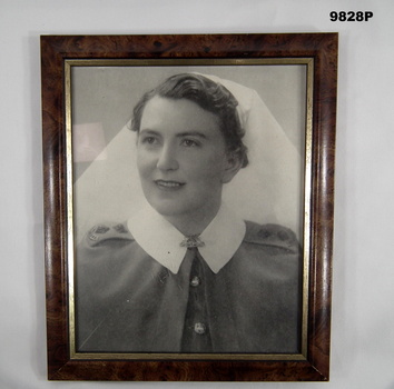 Framed photo of WW2 nurse.