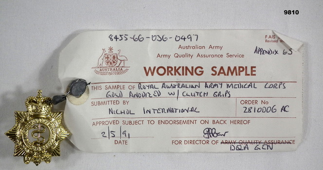 gold coloured badge of Royal Australian Army Medical Corps