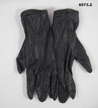 A pair of women's military black leather gloves