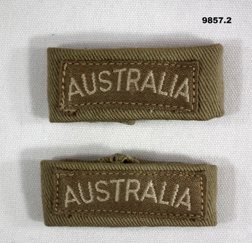 "Australia" badge on cloth loop for epaulettes.