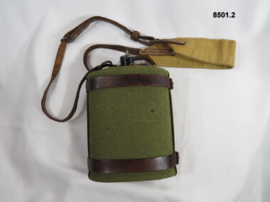 Felt covered blue enameled water bottle and harness.
