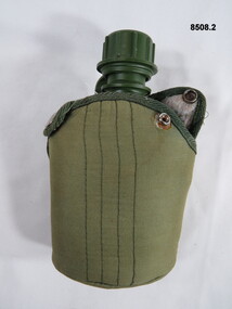 Plastic water bottle and outer carrier.