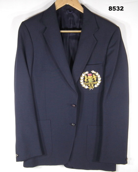 Dark blue blazer - civilian with 38th Battalion badge.