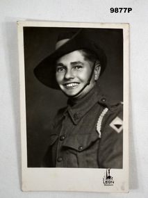 Photographic postcard of an Australian Soldier in uniform.