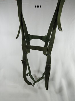 Webbing harness used for carrying extra equipment,