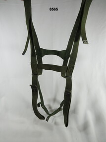 Webbing harness used for carrying extra equipment,